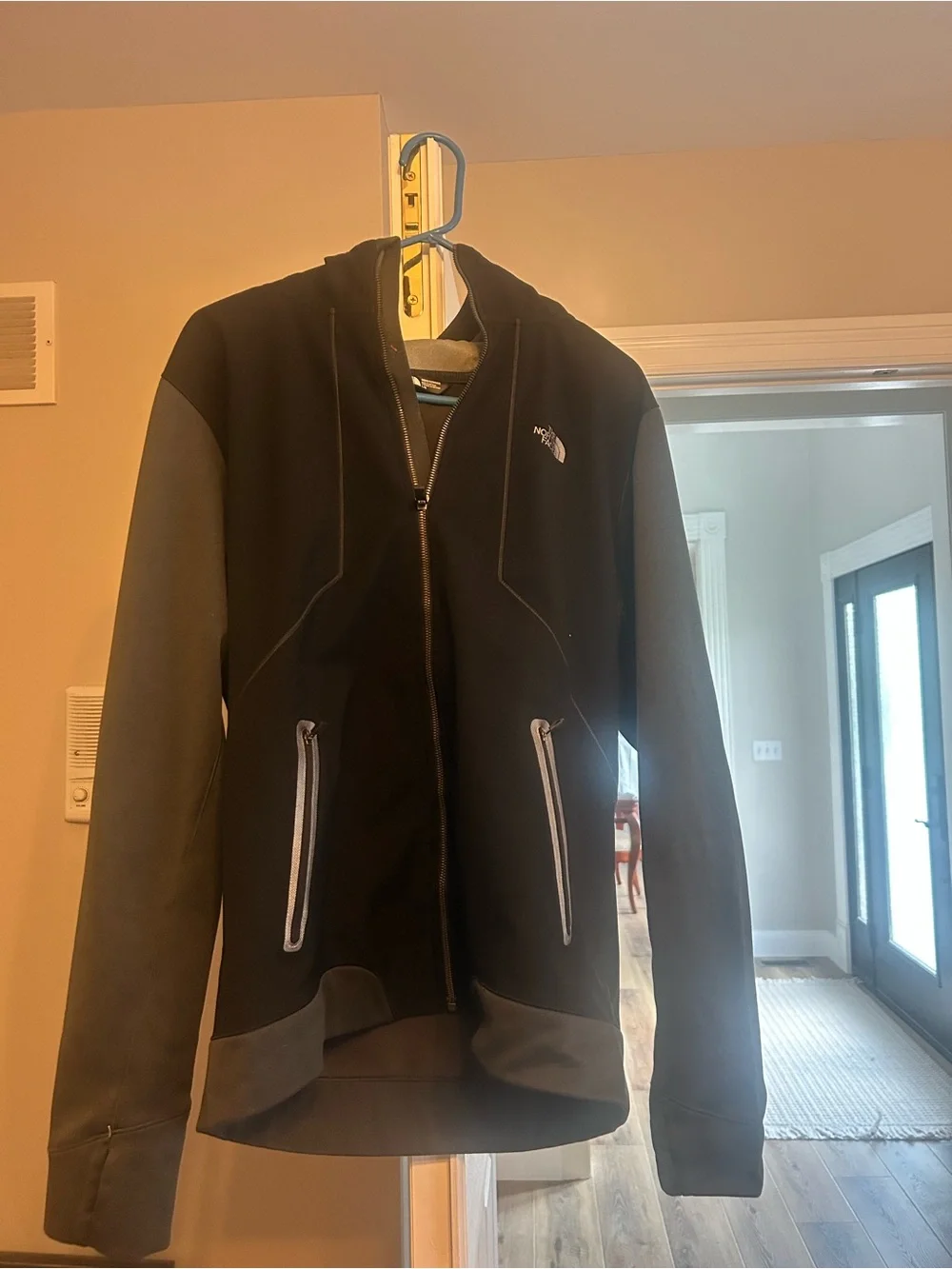 The North Face Men's Kilowatt Jacket, a hooded performance jacket